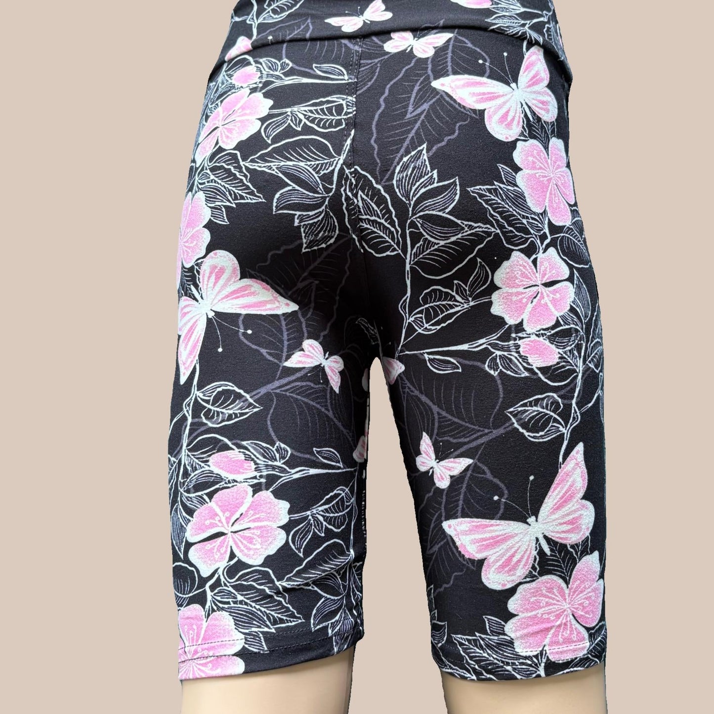 Pink butterfly and flower design Bermuda shorts