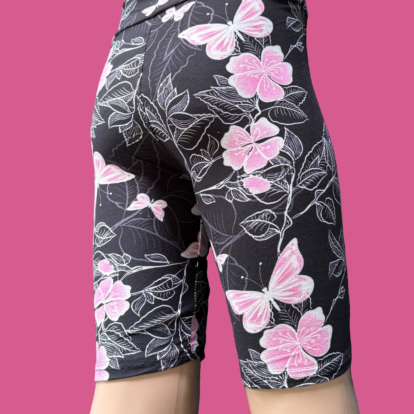 Pink butterfly and flower design Bermuda shorts