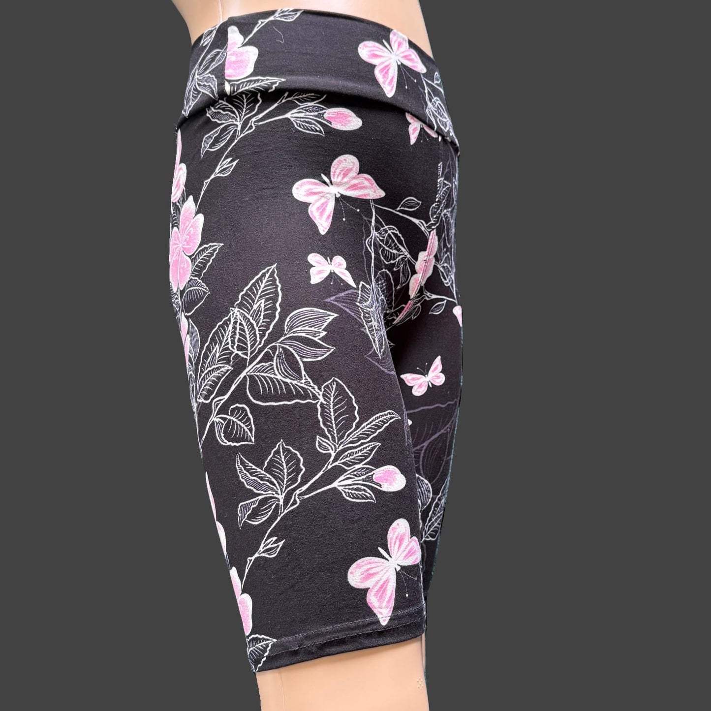 Pink butterfly and flower design Bermuda shorts