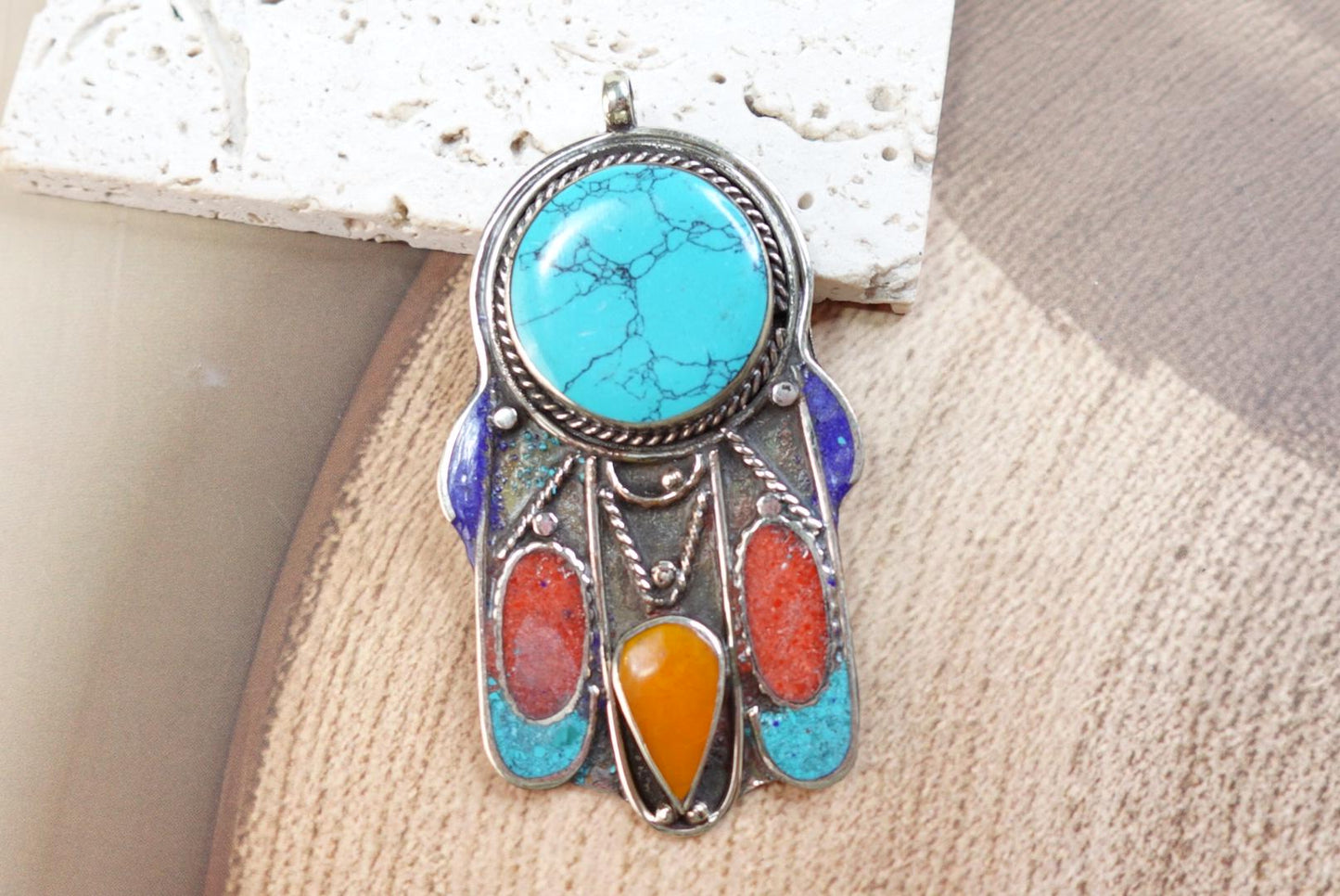 Silver Plated Tibetan Hamsa pendants.