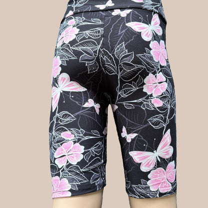 Pink butterfly and flower design Bermuda shorts